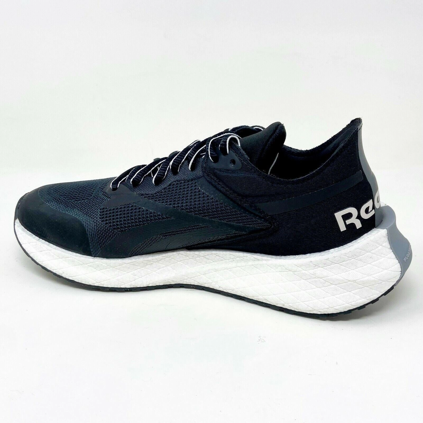 Responsive Cushioned Running Shoe Reebok Floatride Energy Symmetro Black White Womens Size 8 Running Shoes FW7704